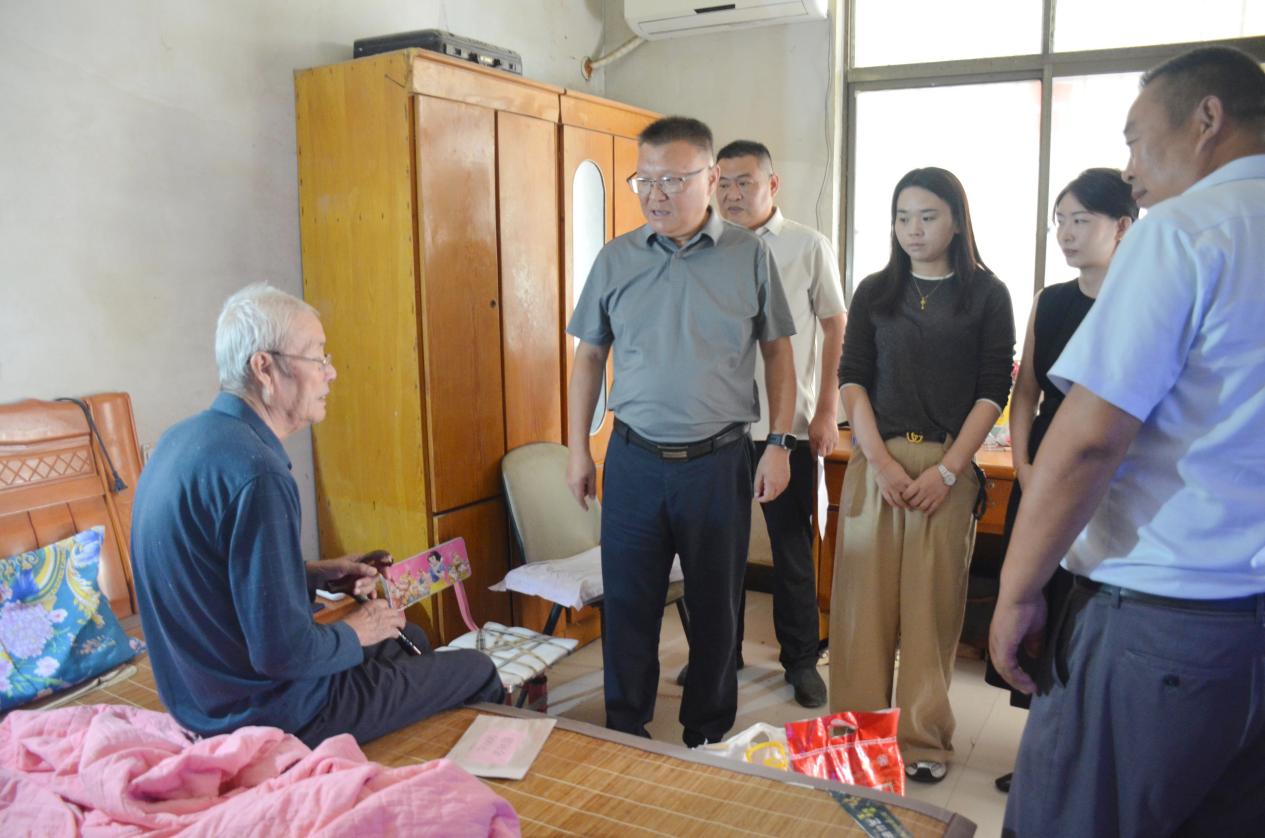 民建淮安市委会赴帮促村调...